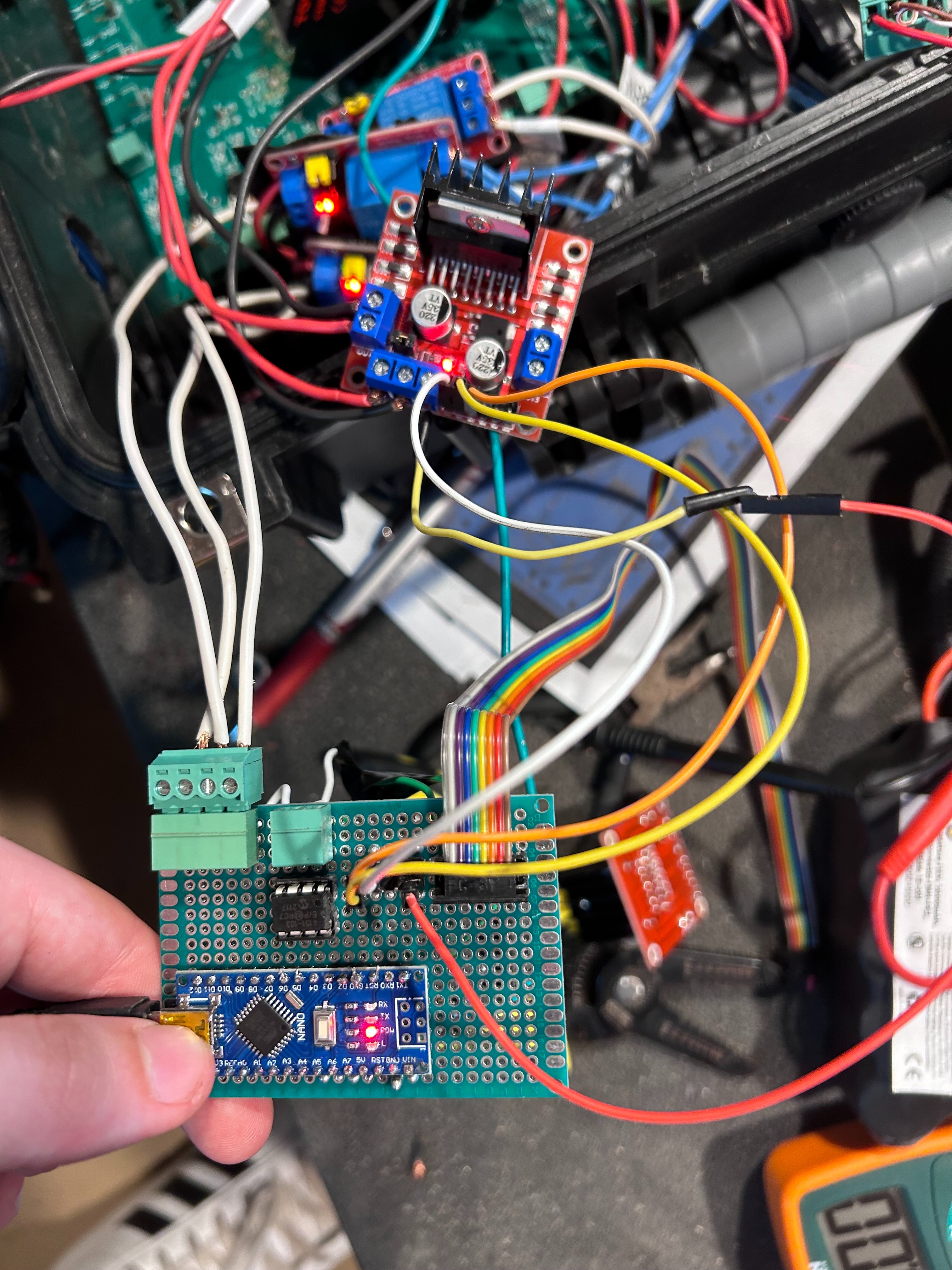 Close up of Arduino, potentiometer, and motor shields